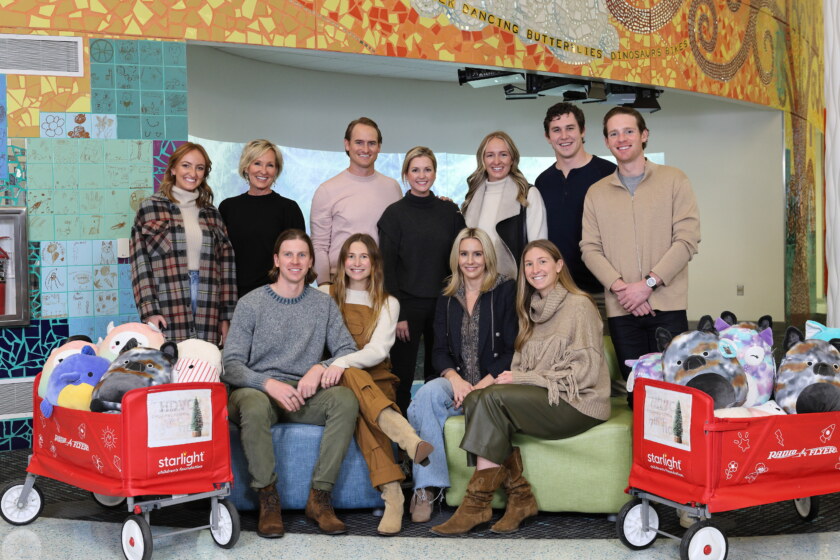 DeVos Family members volunteer at Helen DeVos Children’s Hospital. Front row, left to right: Blake Shue & Hannah VanderWeide Shue, Andrea DeVos, Katie VanderWeide Renker. Back row, left to right: Olivia DeVos Griffioen, Maria DeVos, Dalton & Kelly DeVos, Monreau DeVos Stewart & Peter Stewart and Griffin Renker.