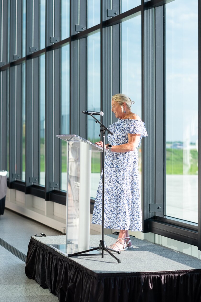 Cheri DeVos speaks at the grand opening of Otter Air in Grand Rapids, Michigan.
